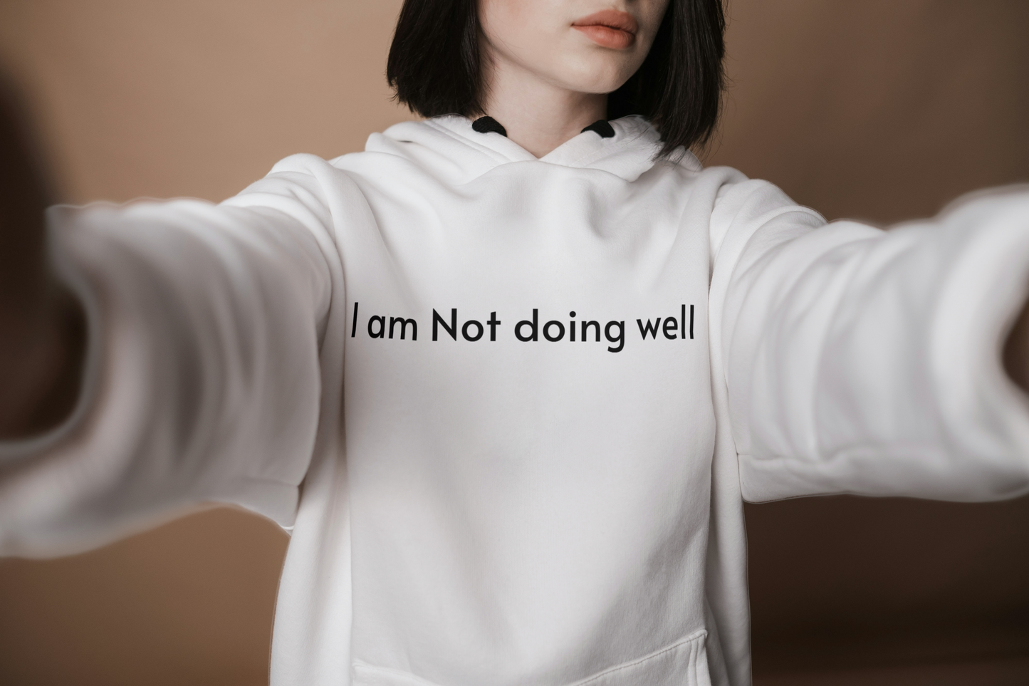 The ‘Not Doing Well’ Hoodie: A Funny Reminder That It’ll Be OK (Eventually)